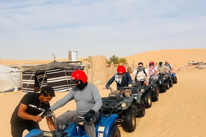 Abu Dhabi Evening Desert Safari: Dune Bashing, Quad Bikes, BBQ & Cultural Shows photo 6