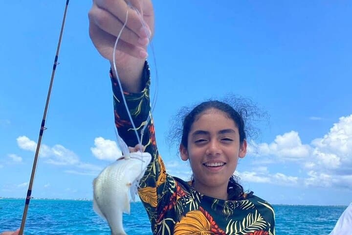 Private Stingray City Boat Tour + Two Snorkel Spots from West Bay photo 6