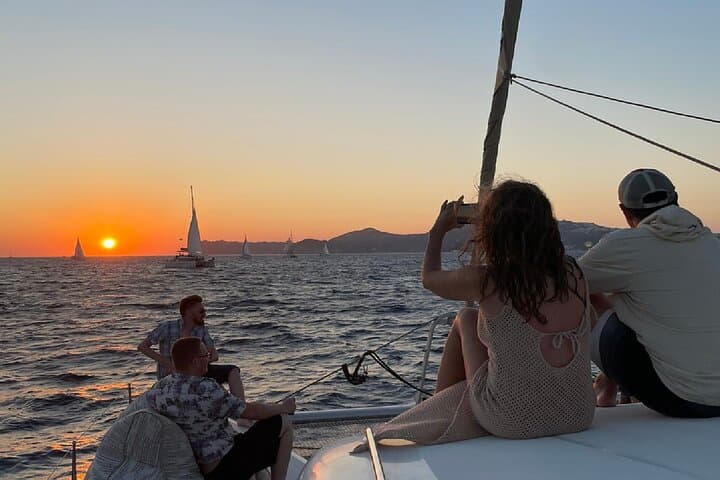 Santorini Sunset Catamaran Cruise: Red Beach, Hot Springs & Dinner