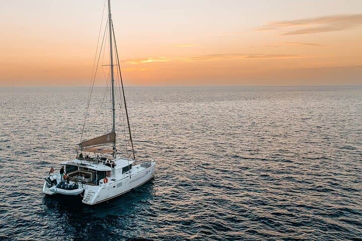 Santorini Sunset Catamaran Cruise: Red Beach, Hot Springs & Dinner photo 2