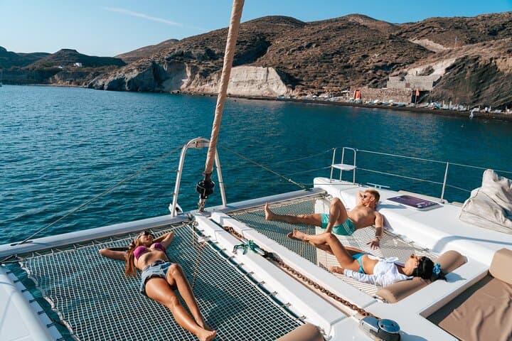Santorini Sunset Catamaran Cruise: Red Beach, Hot Springs & Dinner photo 3