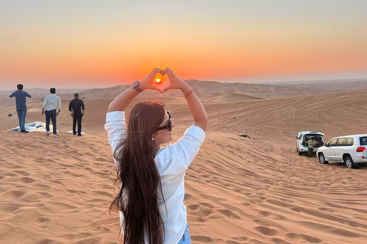 Morning Red Dune Desert Safari: Camel Ride & Sandboarding in Lahbab photo 2