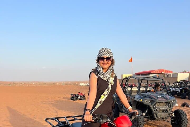 Morning Red Dune Desert Safari: Camel Ride & Sandboarding in Lahbab photo 3