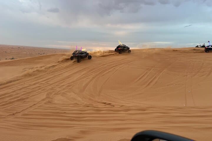 Morning Red Dune Desert Safari: Camel Ride & Sandboarding in Lahbab photo 4