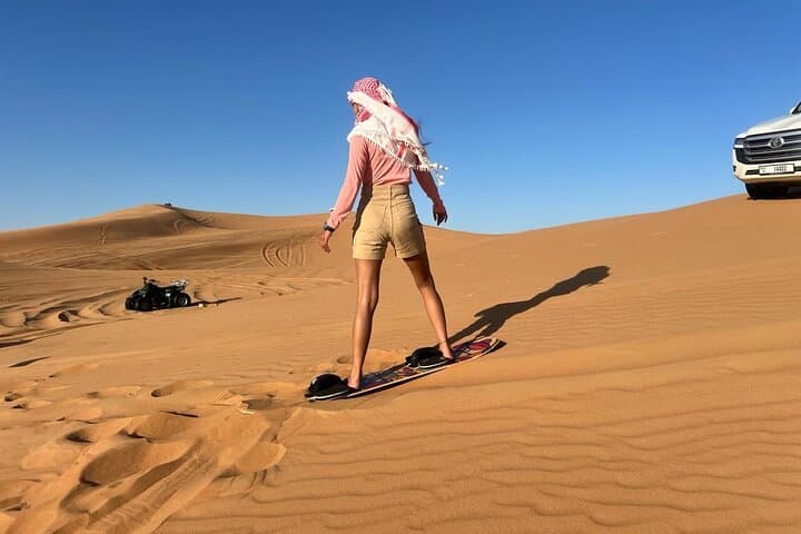 Morning Red Dune Desert Safari: Camel Ride & Sandboarding in Lahbab photo 5