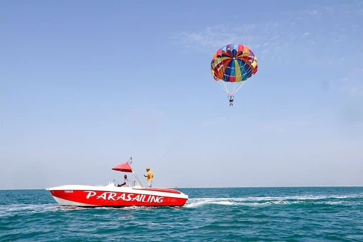 Soar Over Dubai: Parasailing Adventure Above the Arabian Gulf photo 3