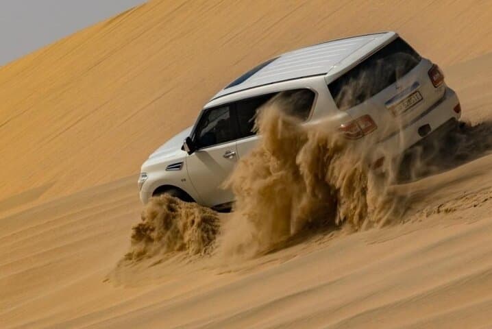 Doha Half-Day Desert Safari: Dune Bashing, Camel Ride & Sandboarding at the Inland Sea photo 2