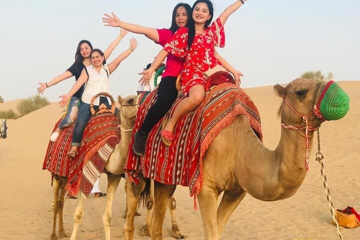 Dubai Red Dune Desert Safari: Camel Ride, Sandboarding & BBQ in Lahbab photo 2