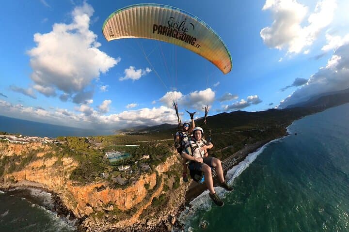 Tandem Paragliding over Cefalù's Coastline: 1-Hour Flight with GoPro Photos photo 4