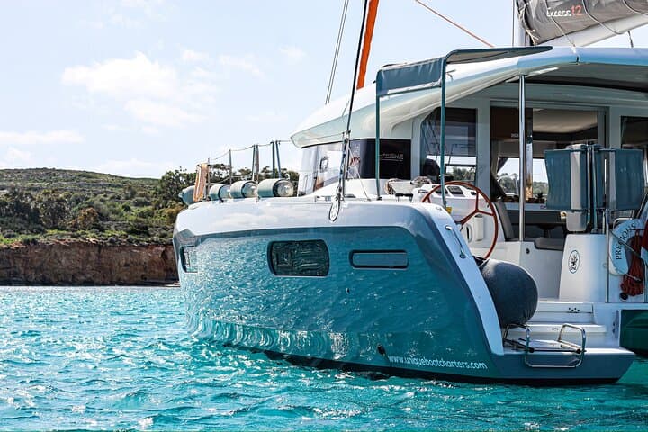 8-Hour Catamaran Charter from Valletta — Blue Lagoon, Snorkeling & Paddleboards