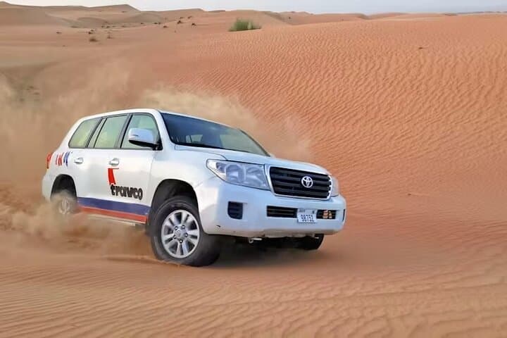 Dubai Desert Safari with BBQ Dinner and Local Driver — Evening Dune Bashing & Camp Experience photo 2
