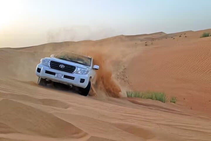 Dubai Desert Safari with BBQ Dinner and Local Driver — Evening Dune Bashing & Camp Experience photo 3