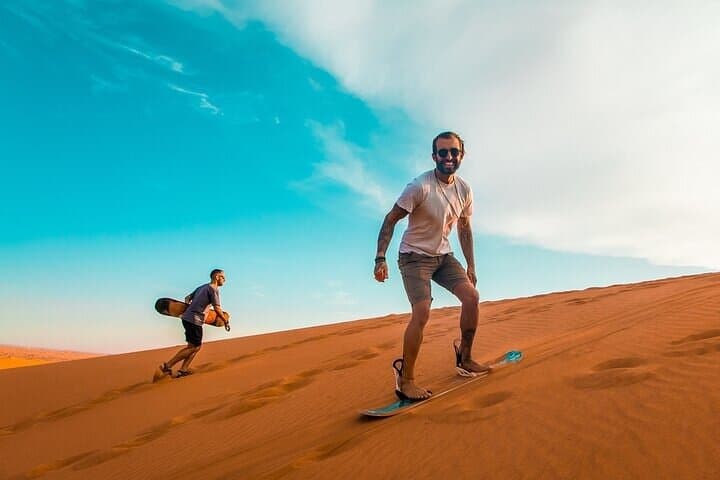 Evening Desert Safari in Dubai: Dune Bashing, Bedouin Camp & BBQ