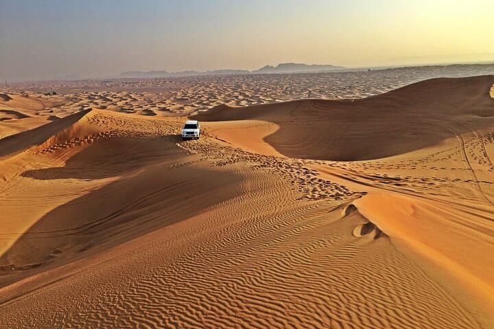Red Dune Desert Safari in Lahbab — Camel Ride, Sandboarding & Dune Bashing from Dubai