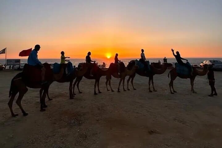 Sunset Camel Ride on Achakkar Beach: Cap Spartel Views & Beach Barbecue in Tangier photo 3