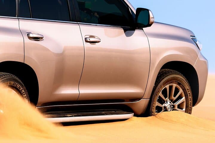 Dubai Evening Desert Safari: Lahbab Dune Bashing, Sandboarding & BBQ Experience photo 5