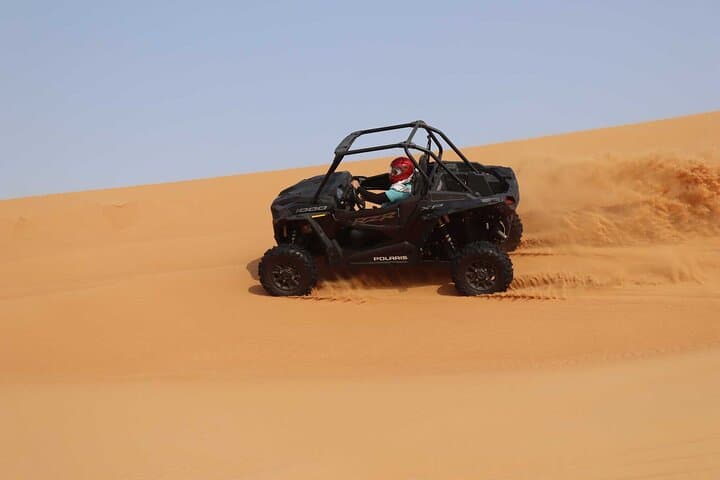 Dubai desert buggy dune bashing, sandboarding, camel ride & Bedouin camp experience photo 6