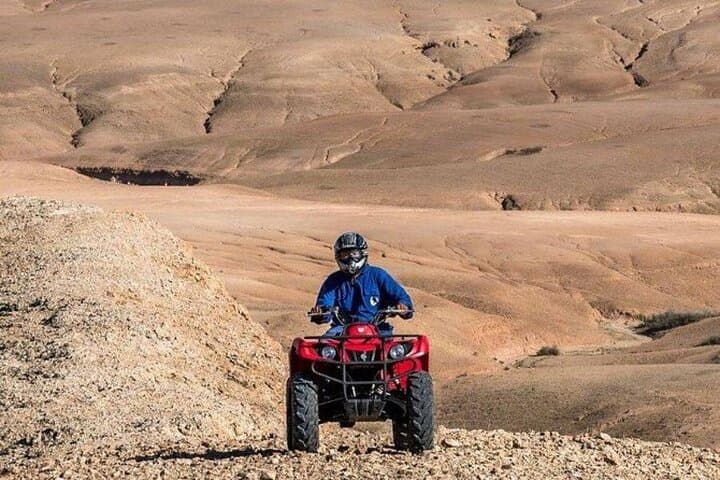 Sunset Quad Biking and Camel Ride in Agafay Desert with Traditional Moroccan Dinner photo 6