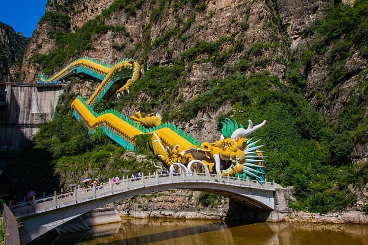 Day Trip to Longqing Gorge & Guyaju Caves: Cruise the Ravine and Explore Ancient Cliff Dwellings