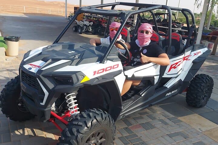Evening Dubai Desert Safari: Dune Bashing, Camel Ride & BBQ