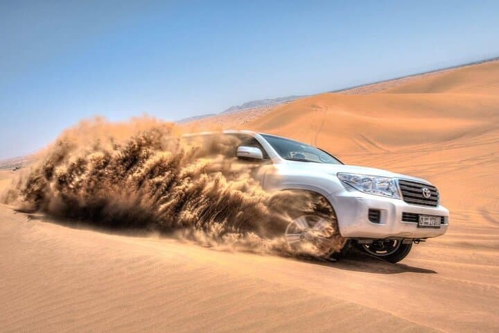Dubai Red Dunes ATV Desert Safari with Camel Ride, Sunset & BBQ