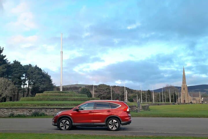 Isle of Man Discovery Tour — Laxey Wheel, Peel Castle & Coastal Wildlife