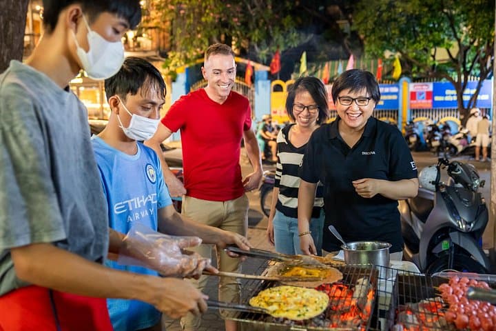 Saigon Evening Street Food Tour — 6-Stop Night Market Tasting Walk photo 1