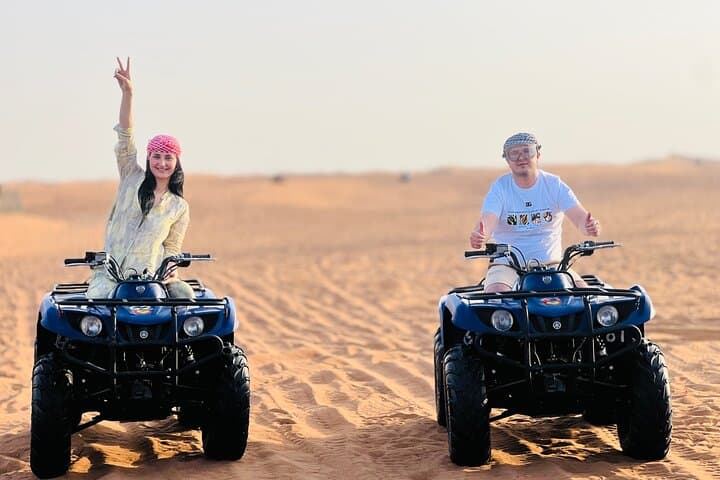 Sunset Dune Rush: Evening ATV, Dune Bashing & Desert BBQ in Dubai
