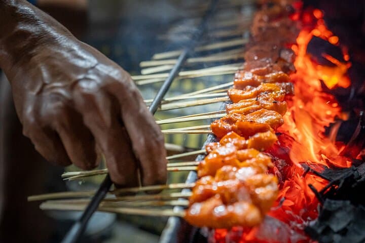 Bali Night Market Food Tour: Sanur Coconut Start to Badung Babi Guling