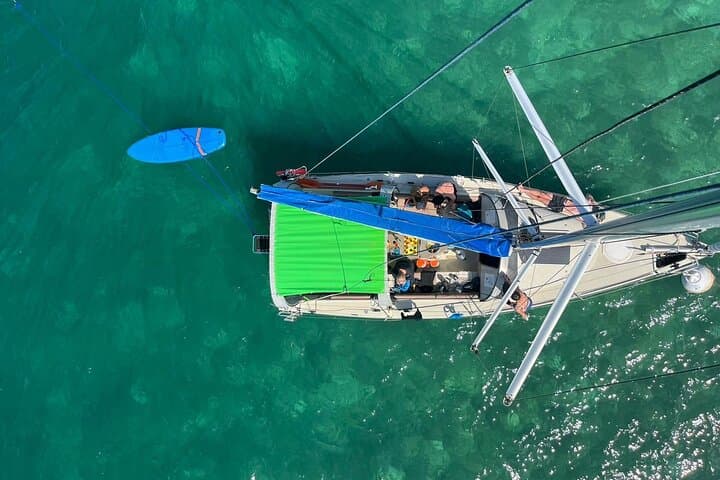 Full-Day Lagoon Sail to Îlets de la Biche — Snorkel, Paddle & Wreck Dive in Guadeloupe