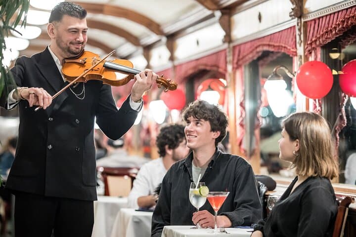 Budapest Evening Danube Cruise: Wine, Live Folk Music & Illuminated Landmarks