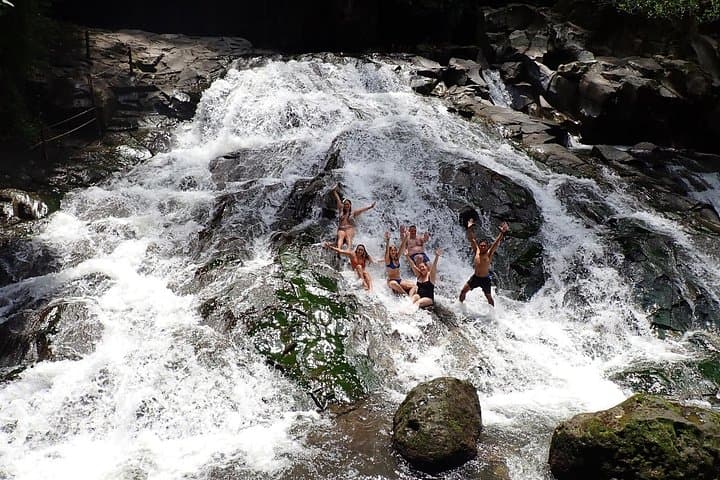 Half-Day Ubud Waterfall Tour: Tibumana, Taman Sari & Goa Rang Reng photo 1