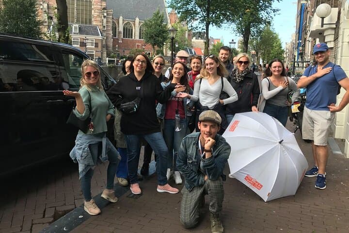 Walk Amsterdam with a Local Storyteller — 2-Hour Dam Square to Canal Tour photo 3