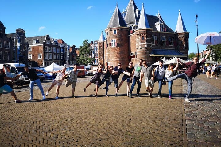 Walk Amsterdam with a Local Storyteller — 2-Hour Dam Square to Canal Tour photo 2