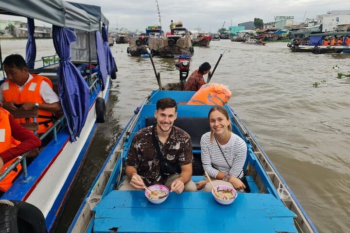 Private Mekong Delta Tour: 2-Day Floating Market, Homestay & Biking Adventure photo 2