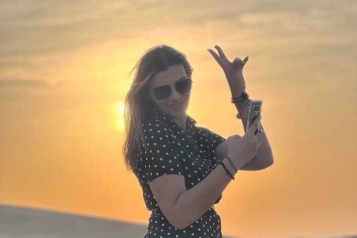 Sunrise Desert Safari in Abu Dhabi: Private Camel Ride, Dune Bashing & Sandboarding photo 3