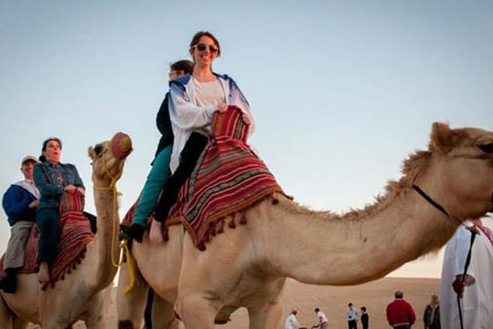 Sunrise Desert Safari in Abu Dhabi: Private Camel Ride, Dune Bashing & Sandboarding photo 4