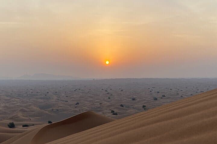 Evening Desert Safari and Camel Ride in Dubai's Red Dunes photo 2