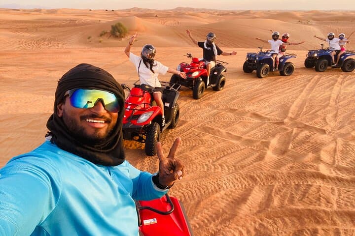 Dubai Red Dunes Quad Biking, Camel Ride & Desert BBQ Experience