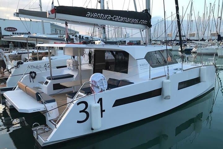 Private Catamaran Tour to Polignano and Monopoli: Coastal Caves, Cliff-Diving Views & Swim Stops