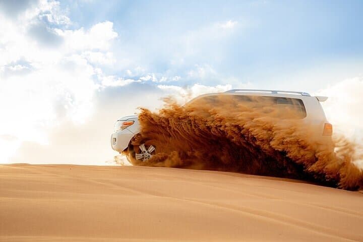 Dubai Evening Desert Safari & BBQ Dinner — Sunset Dune-Bashing and Bedouin Camp Experience photo 5