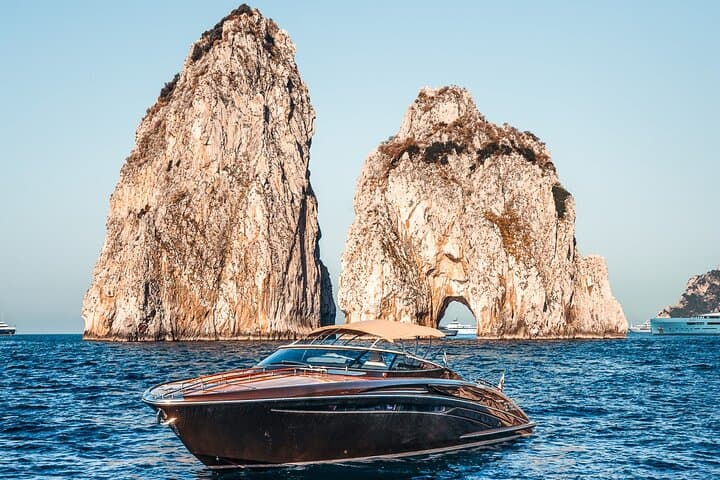 Capri Half-Day Rivarama 44 Speedboat Tour: Blue Grotto, Faraglioni & Snorkel photo 6