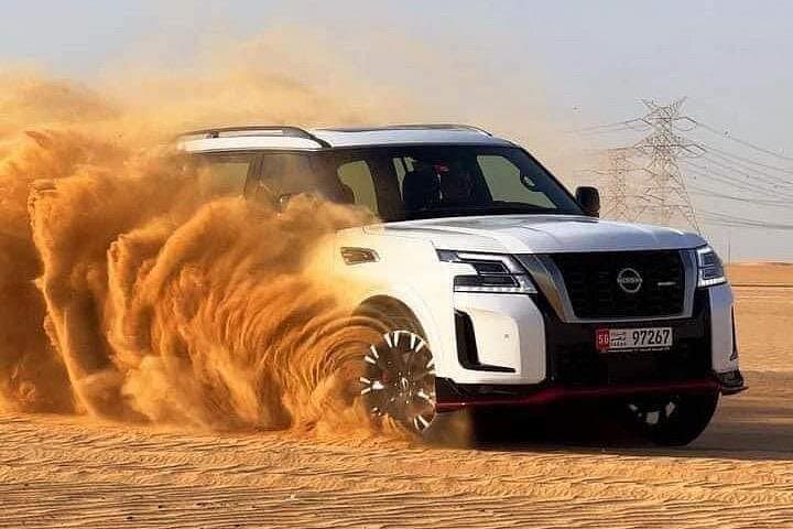 Dubai Desert Safari Tour: Sunset Dune Bashing, Camel Rides & Desert Camp Experience