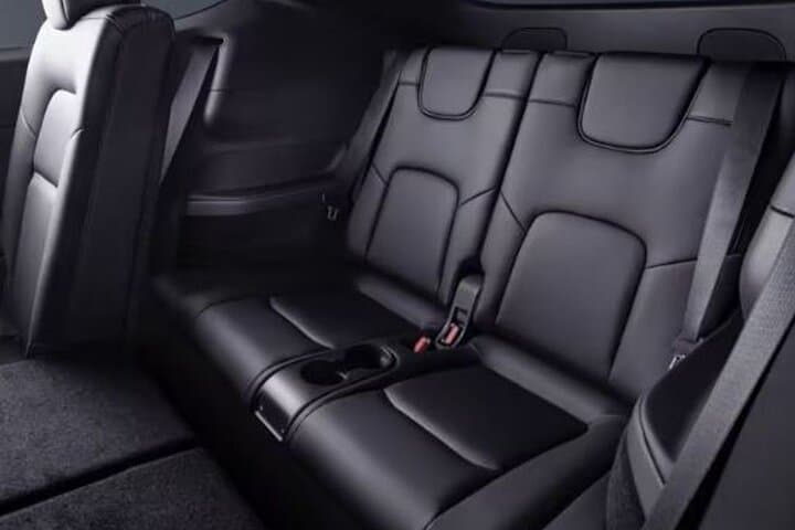 Eco Sedan Private Transfer DWC to Dubai by Tesla photo 3