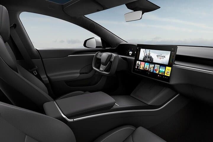 Eco Sedan Private Transfer DWC to Dubai by Tesla photo 2
