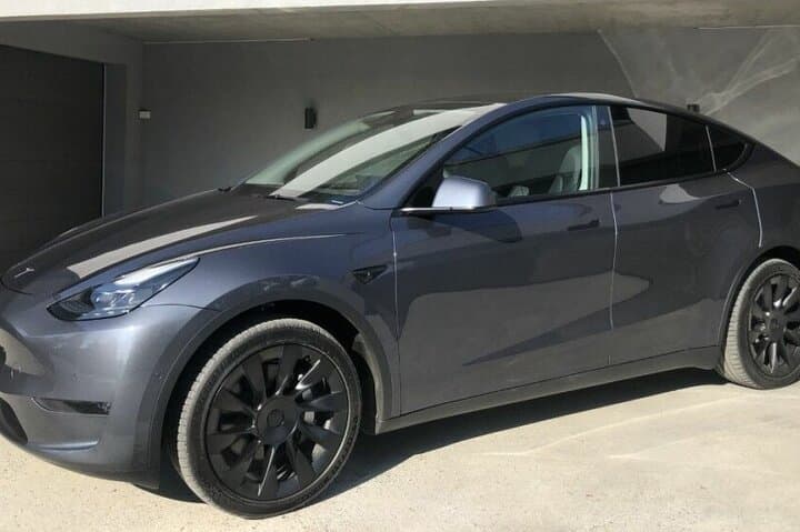 Eco Sedan Private Transfer DWC to Dubai by Tesla photo 6