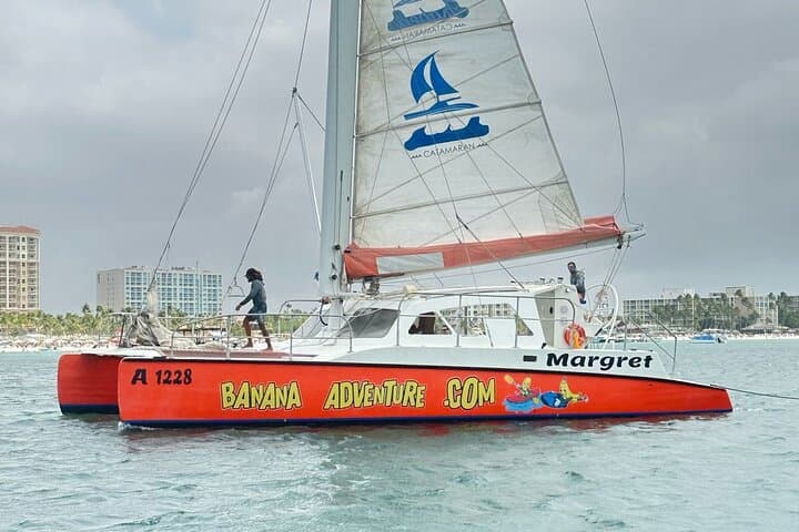 Sunset Catamaran Cruise in Aruba: Banana Adventure Tropical Evening Sail photo 1