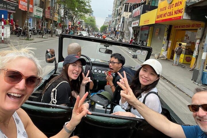 Hanoi Jeep Tour: Old Quarter, B‑52 Lake, Long Bien Bridge & Train Street Food Crawl photo 2
