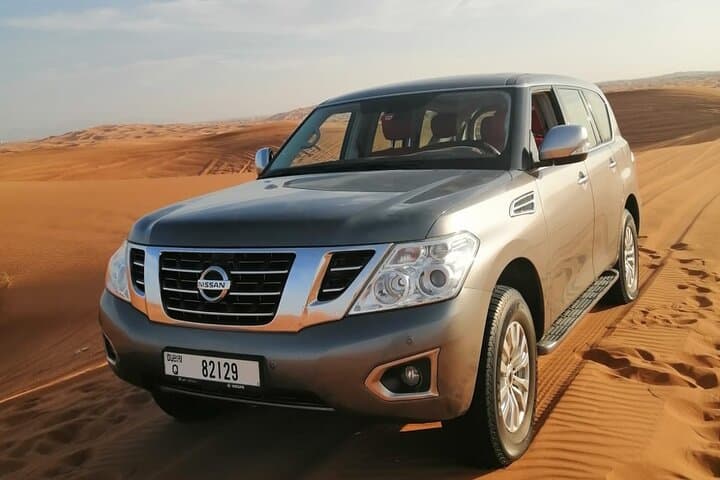 Dubai Morning Desert Safari: Private Dune Bashing, Camel Ride & Sandboarding photo 6