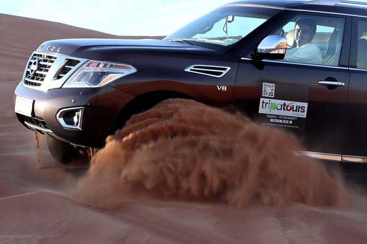 Dubai Desert Safari: Dune Bashing, Sandboarding & Camel Ride Adventure